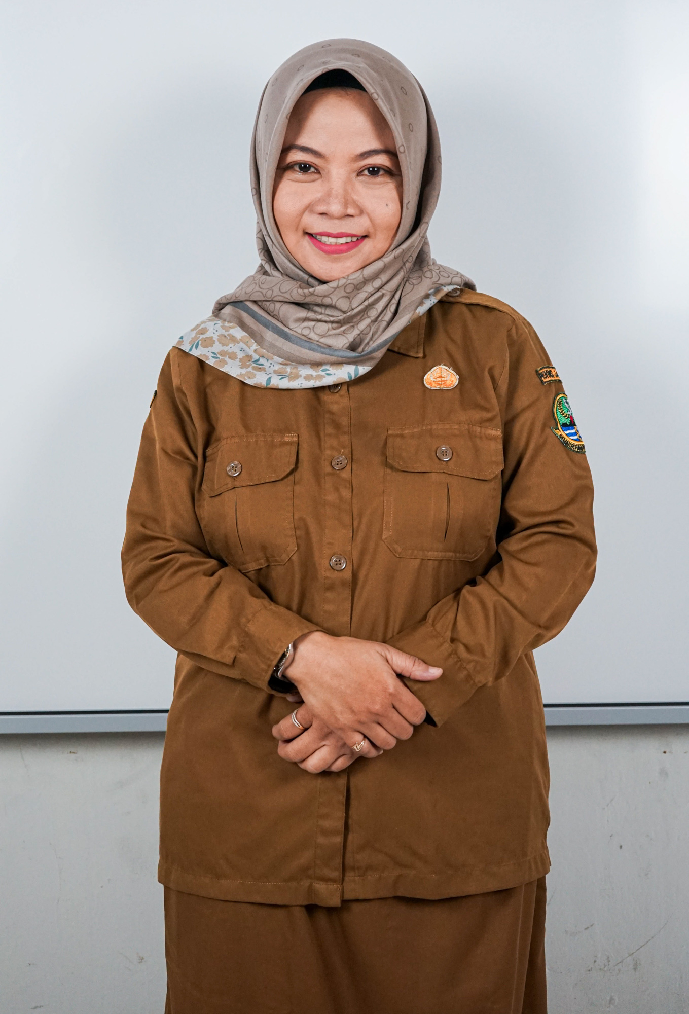 Bu Agustini - Staff Name - SMAN 21 Bandung class 2025