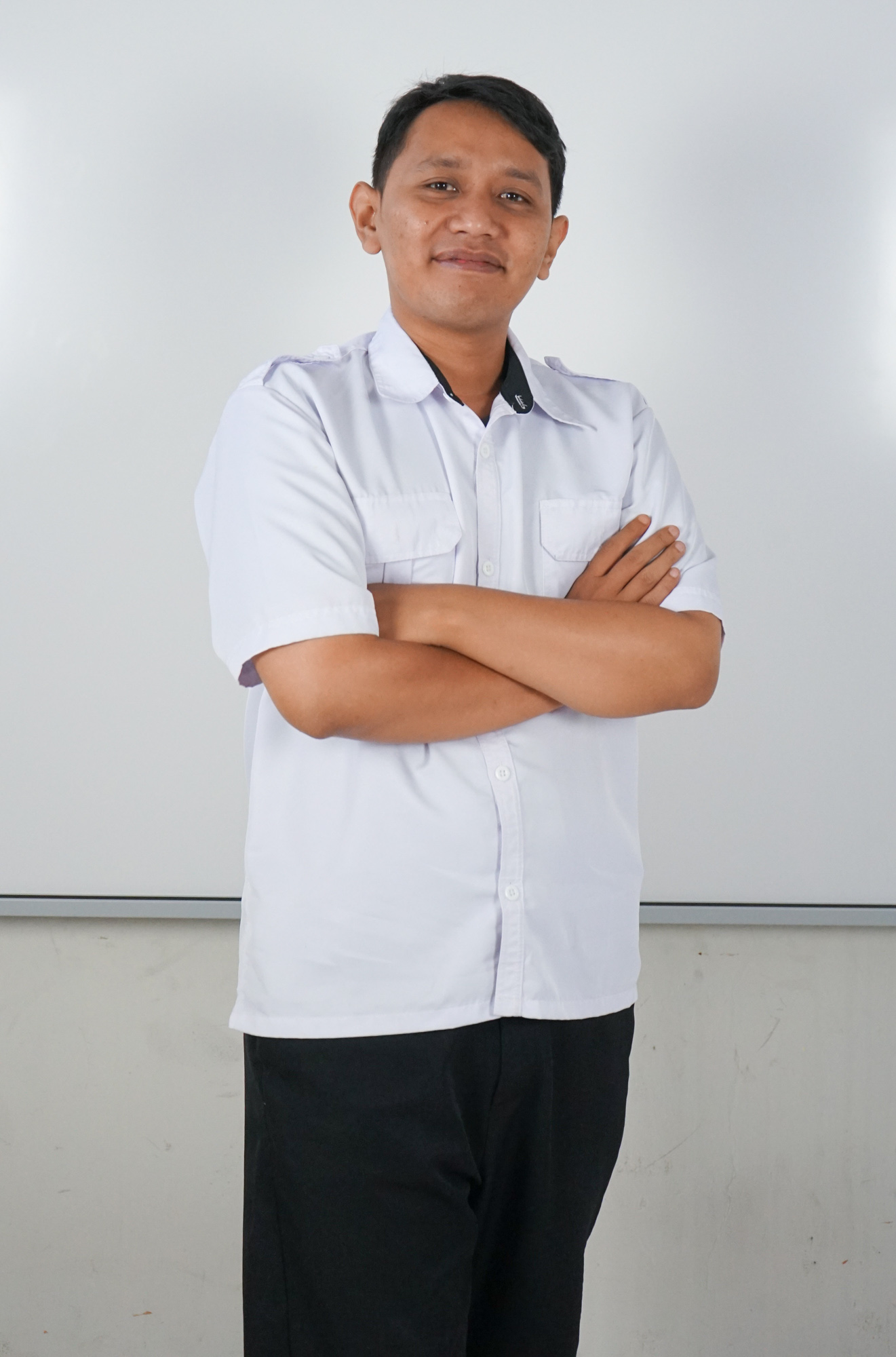 Pak Daniel - Staff Name - SMAN 21 Bandung class 2025